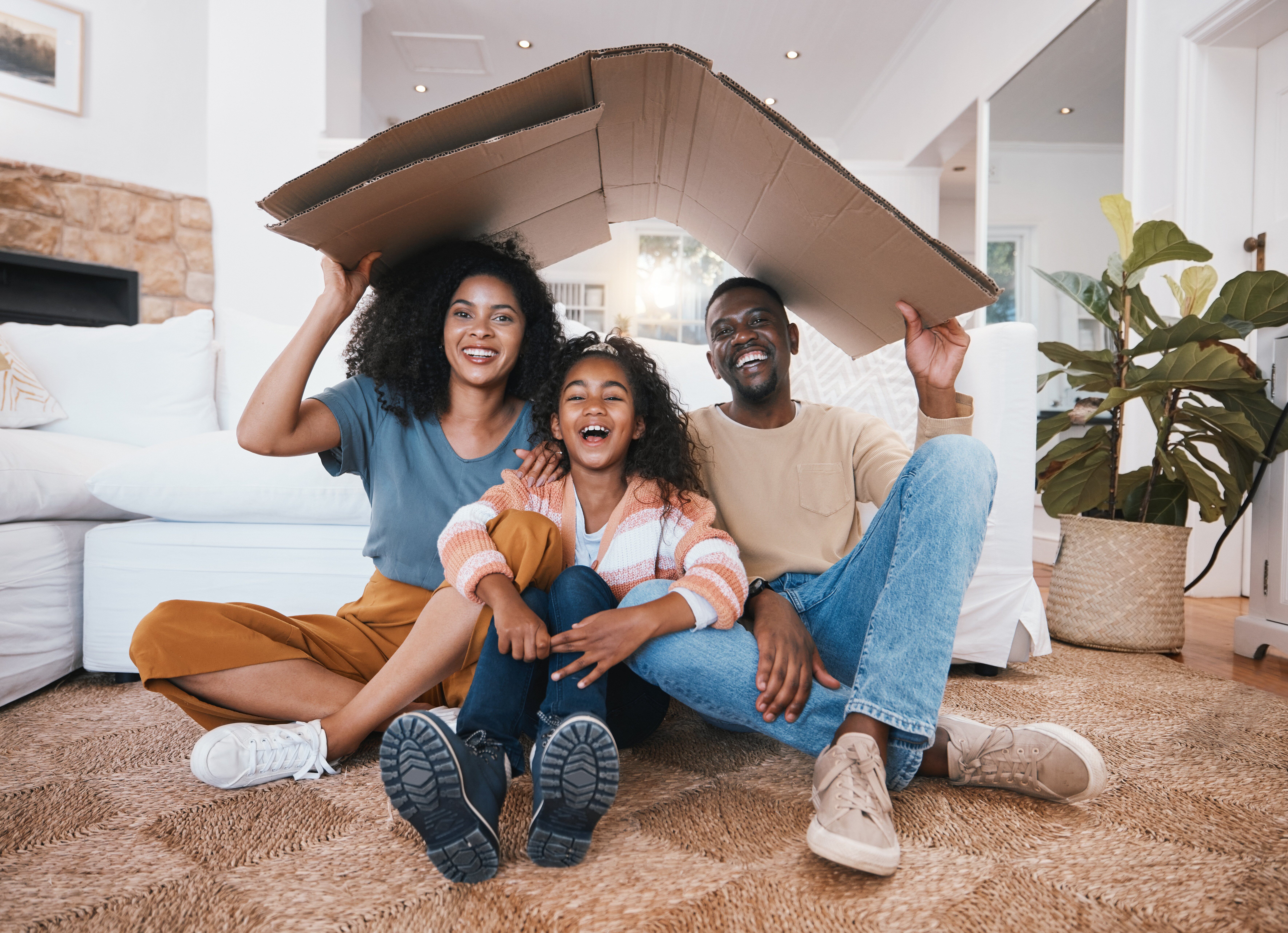 Family sitting in living room